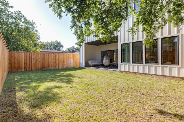 view of yard with a fenced backyard