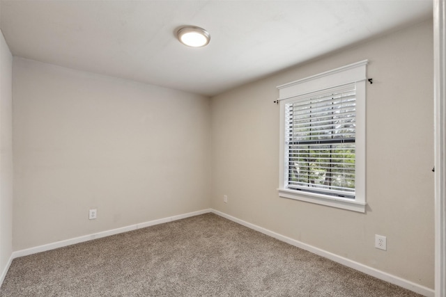 3018 Scorpio Dr, Granbury, TX 76049 - spare room with carpet floors and baseboards