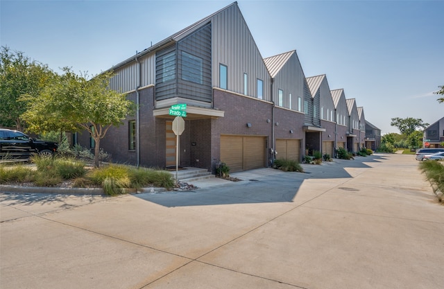 view of property exterior with a garage