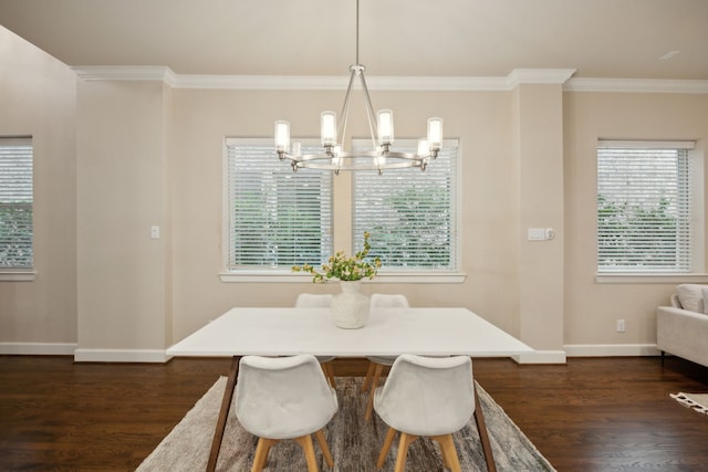 dining room featuring dark hardwood / wood-style floors, an inviting chandelier, and ornamental molding