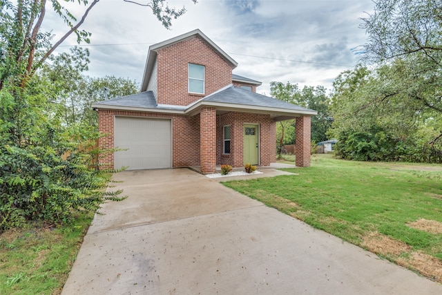 view of front of house featuring a garage and a front lawn