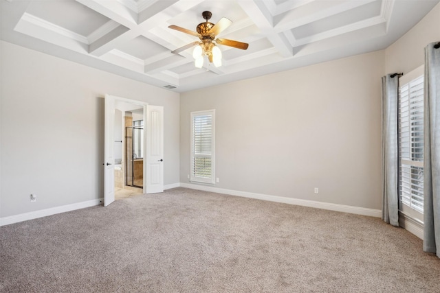 unfurnished bedroom with beam ceiling, ceiling fan, light colored carpet, and coffered ceiling