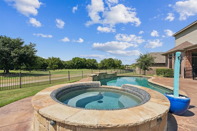 view of swimming pool featuring an in ground hot tub