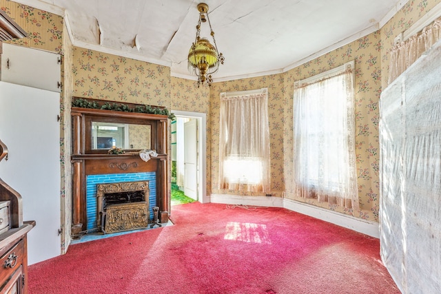 living room featuring ornamental molding and carpet flooring