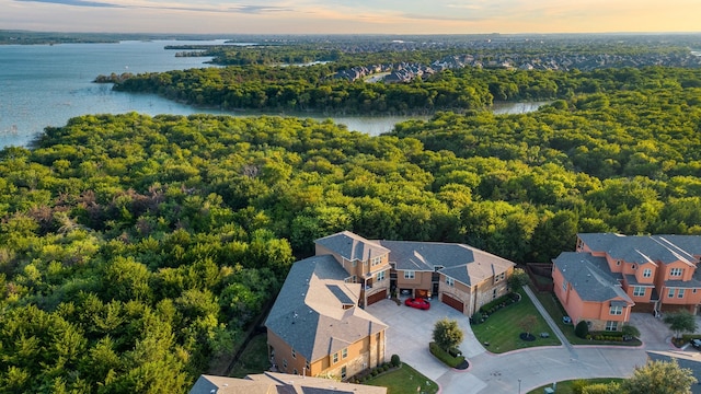 aerial view at dusk with a water view