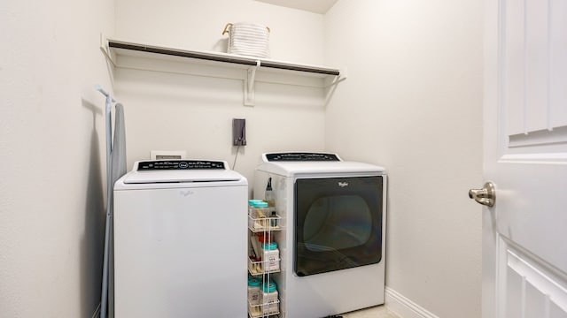 washroom featuring separate washer and dryer