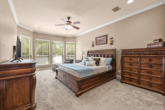 bedroom featuring ceiling fan, light colored carpet, and ornamental molding