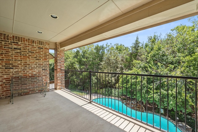 view of patio featuring a fenced in pool