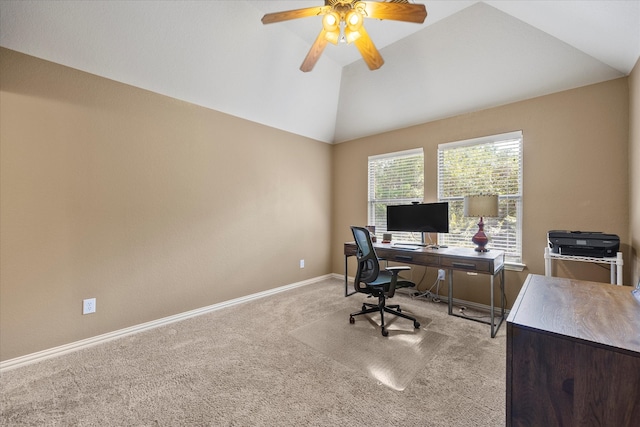 carpeted office space featuring ceiling fan and lofted ceiling