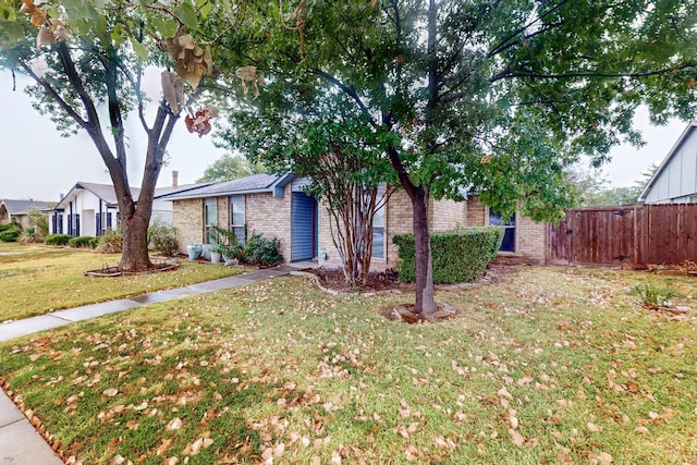 view of front of home with a front lawn