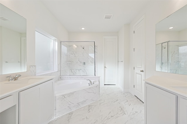 bathroom with marble finish floor, a marble finish shower, two vanities, and a sink