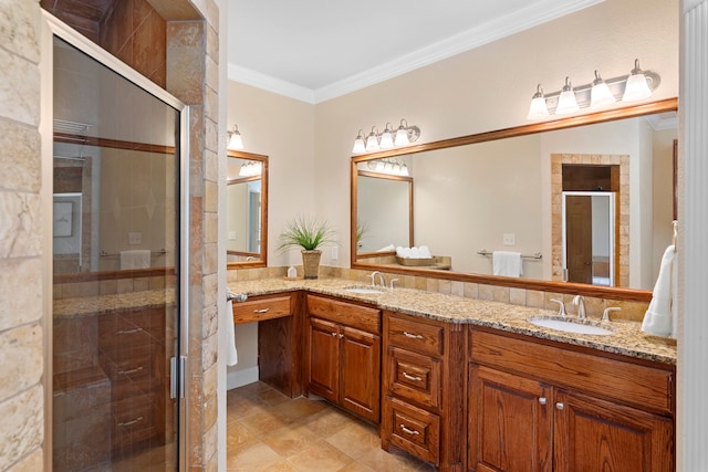 bathroom with walk in shower, vanity, and crown molding