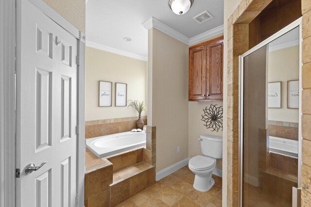 bathroom with tile patterned floors, toilet, separate shower and tub, and crown molding