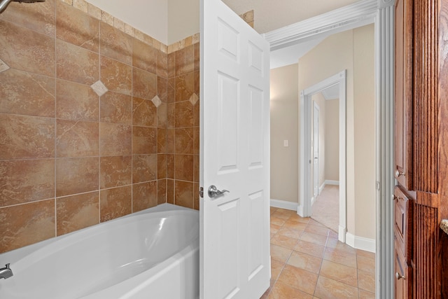 bathroom featuring tile patterned floors and separate shower and tub