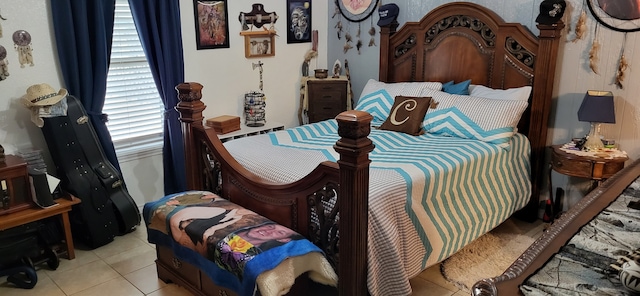 bedroom featuring light tile patterned floors