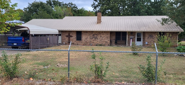 single story home with a front lawn