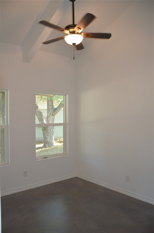 empty room with ceiling fan and vaulted ceiling with beams