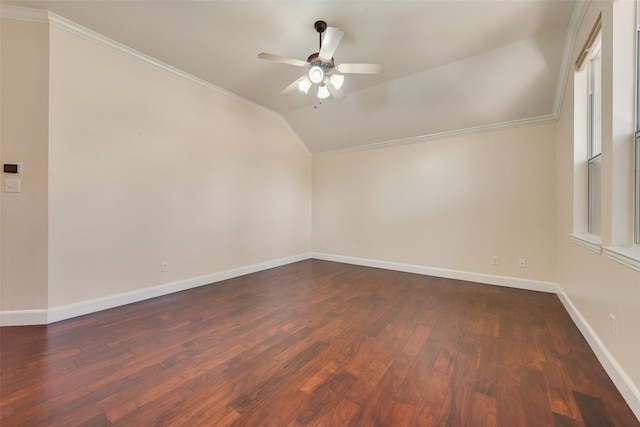 spare room with lofted ceiling, ceiling fan, dark hardwood / wood-style floors, and ornamental molding