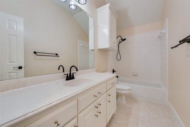 full bathroom with tiled shower / bath combo, vanity, toilet, and tile patterned flooring