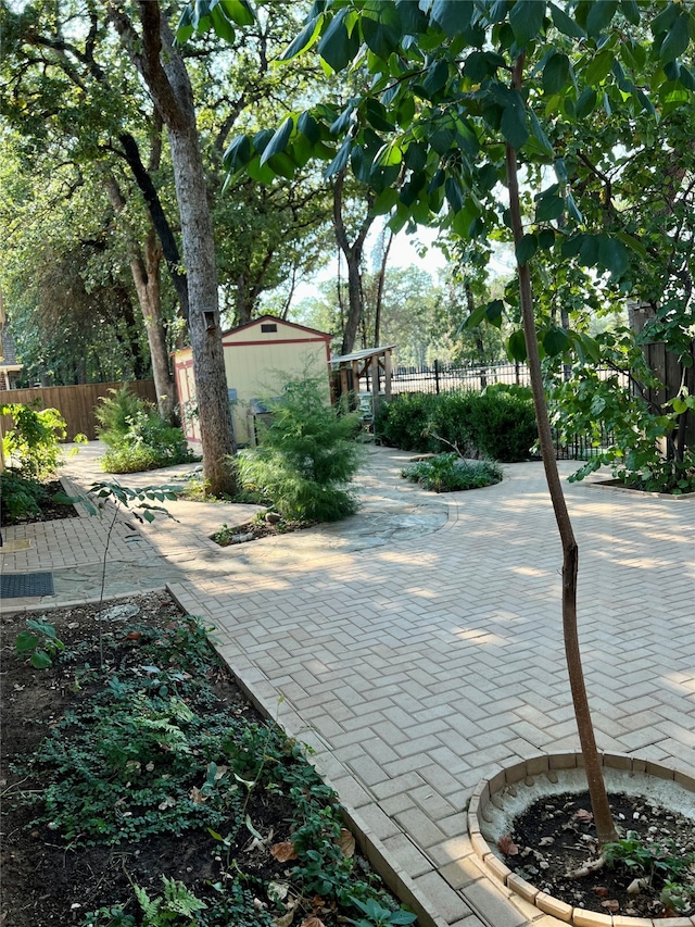 view of patio with an outdoor structure