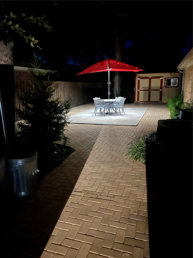 view of patio at night