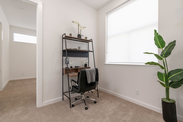 office area with light colored carpet