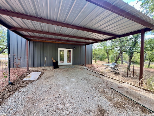 view of patio featuring a carport and french doors