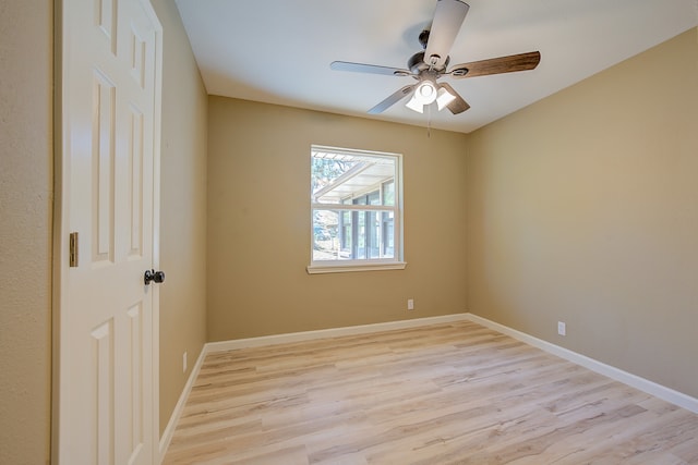 unfurnished room featuring light hardwood / wood-style flooring and ceiling fan