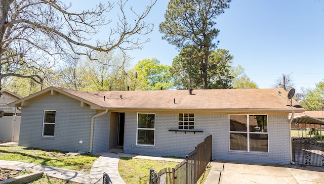 back of property featuring a patio area