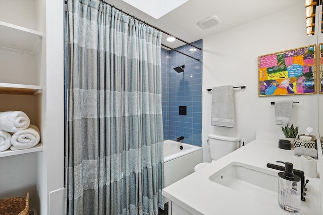 full bathroom featuring shower / bath combo, toilet, and vanity