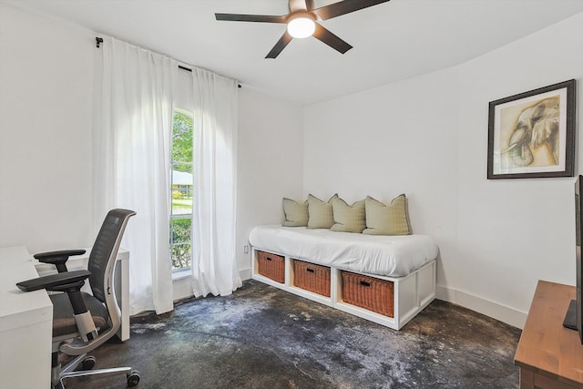 bedroom with multiple windows and ceiling fan