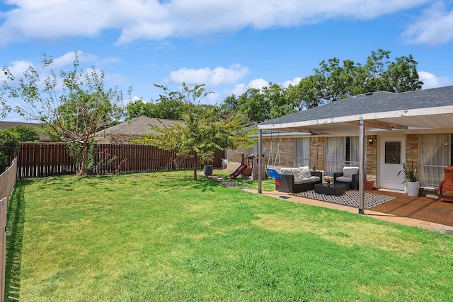 view of yard featuring an outdoor living space and a patio area