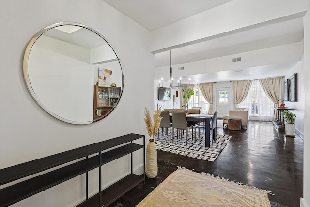 interior space with a chandelier