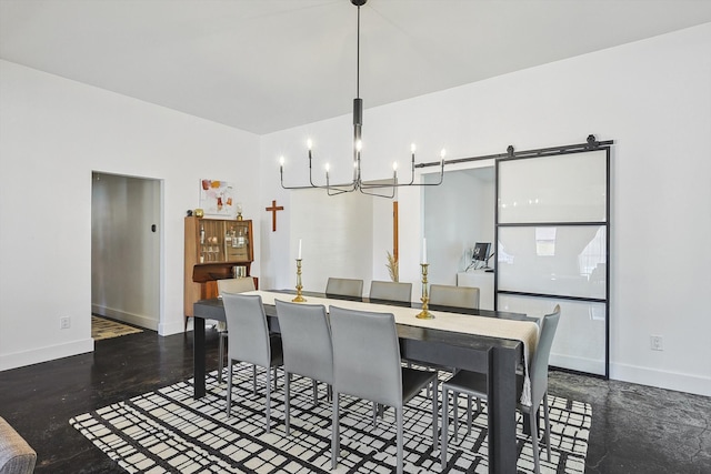 dining area with a barn door and an inviting chandelier