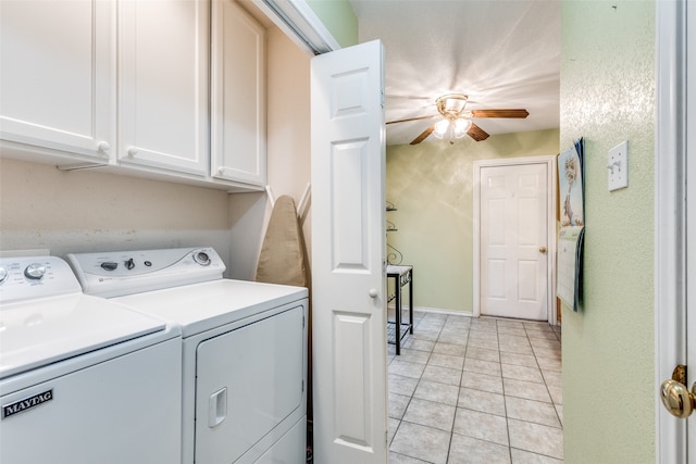 washroom with washer and dryer, cabinets, ceiling fan, and light tile patterned floors