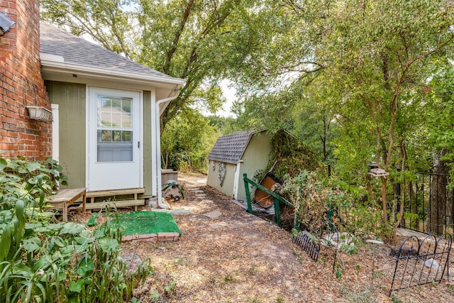 view of patio with a shed