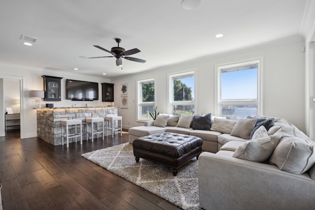 living room with ceiling fan, dark hardwood / wood-style floors, and ornamental molding