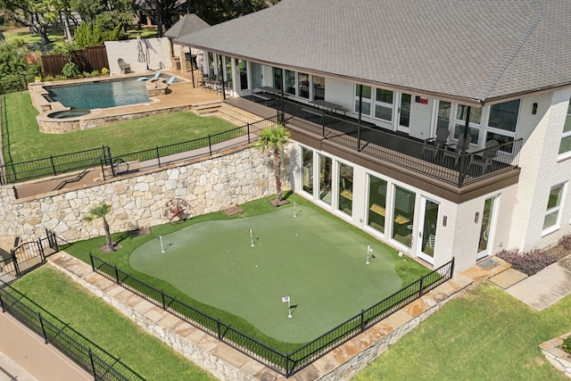 exterior space with a patio area and a swimming pool