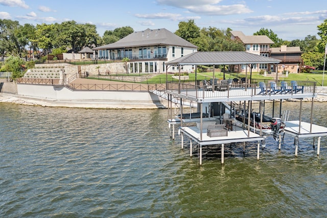 view of dock with a water view