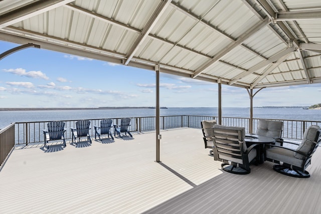 wooden terrace with a water view