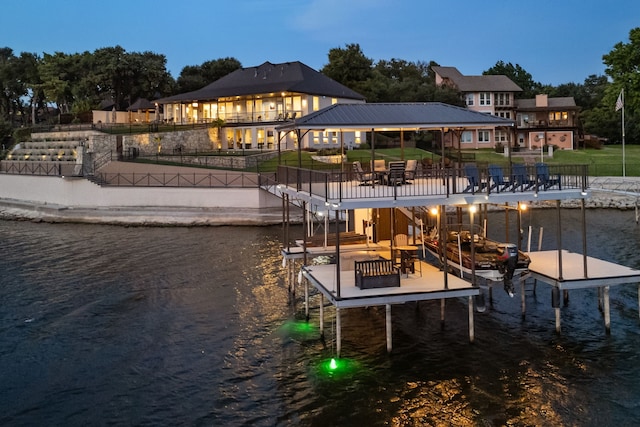 view of dock with a water view and boat lift