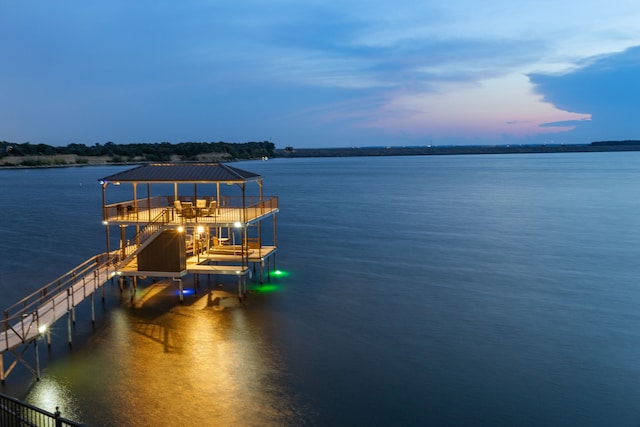 dock area featuring a water view