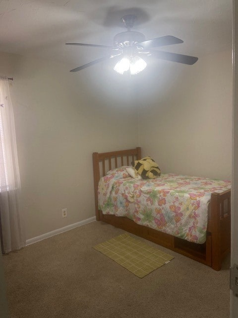 unfurnished bedroom featuring carpet and ceiling fan