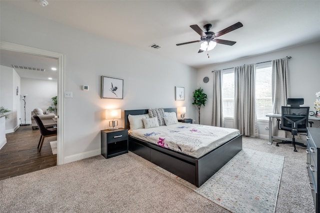 bedroom featuring ceiling fan and light hardwood / wood-style floors