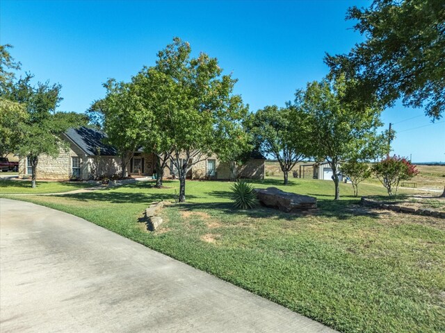 view of front facade with a front lawn