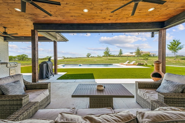 view of patio / terrace featuring an outdoor living space, grilling area, and ceiling fan