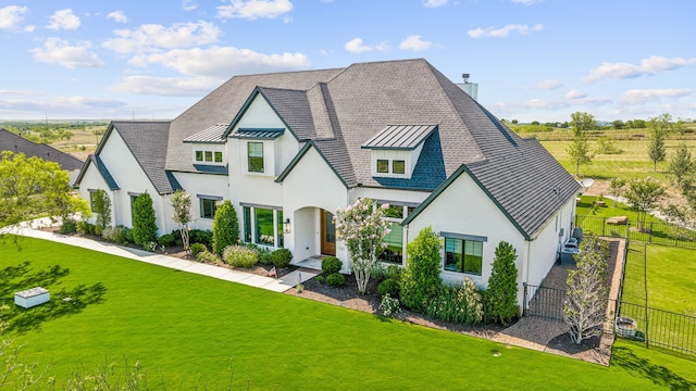 view of front of property with a front lawn