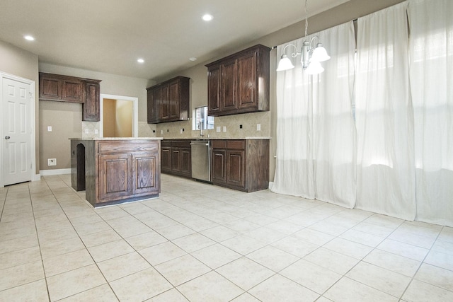 kitchen with dark brown cabinetry, dishwasher, a kitchen island, tasteful backsplash, and hanging light fixtures