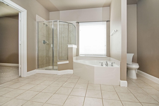 bathroom with toilet, tile patterned flooring, and shower with separate bathtub