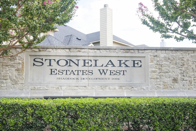 view of community sign